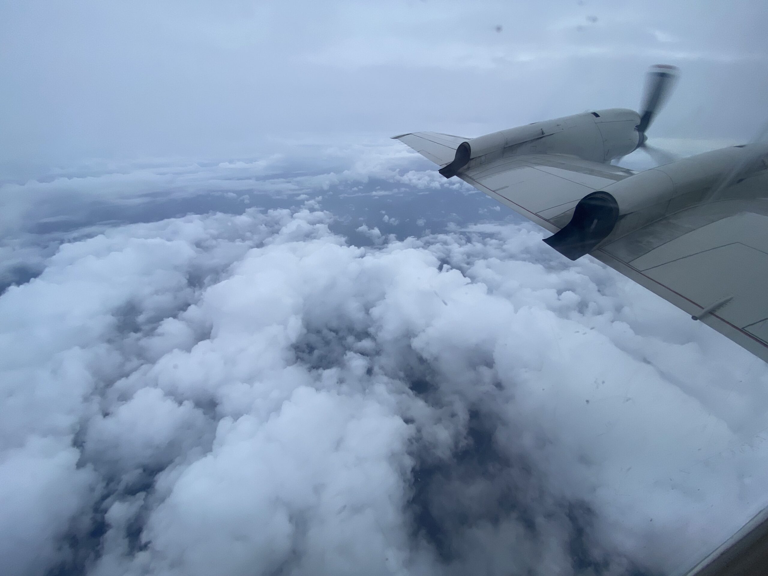 Airplane over hurricane