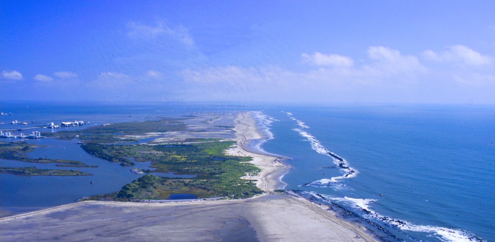 Effects of sediment at East Timbalier Island, Lafourche Parish, Louisiana, July 2000. Photo credit: NOAA Restoration Center, Erik Zobrist.